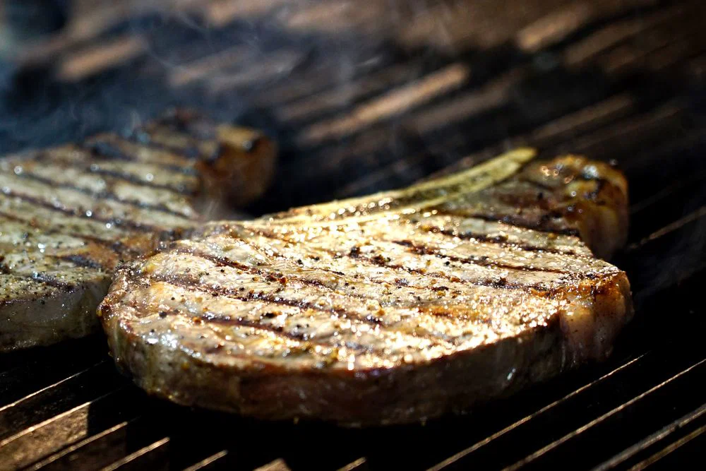 A steak grilled on a professional Josper grill